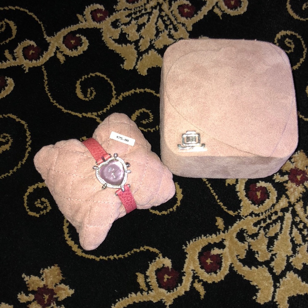 JLo Pink watch with a heart face